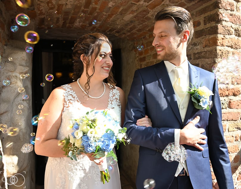 Couple leaving wedding ceremony