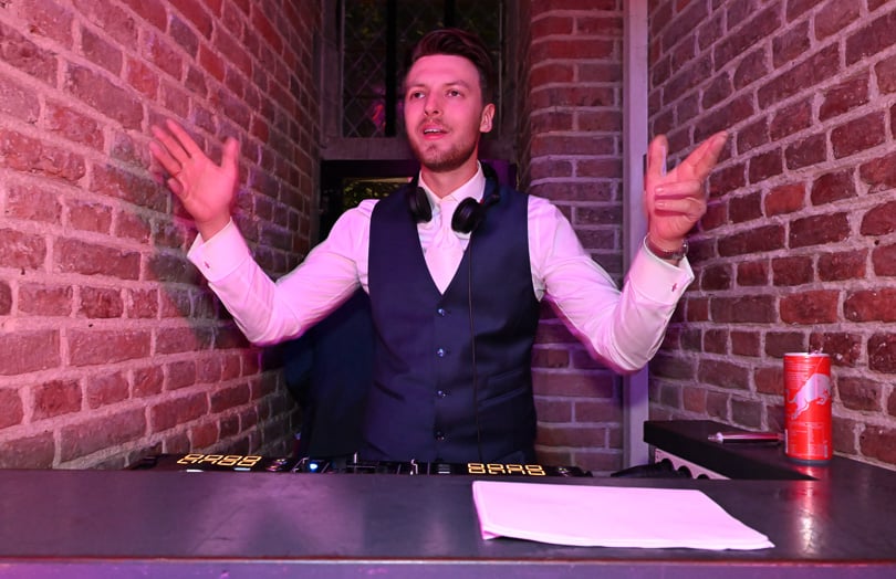 Bridegrome as DJ at wedding party