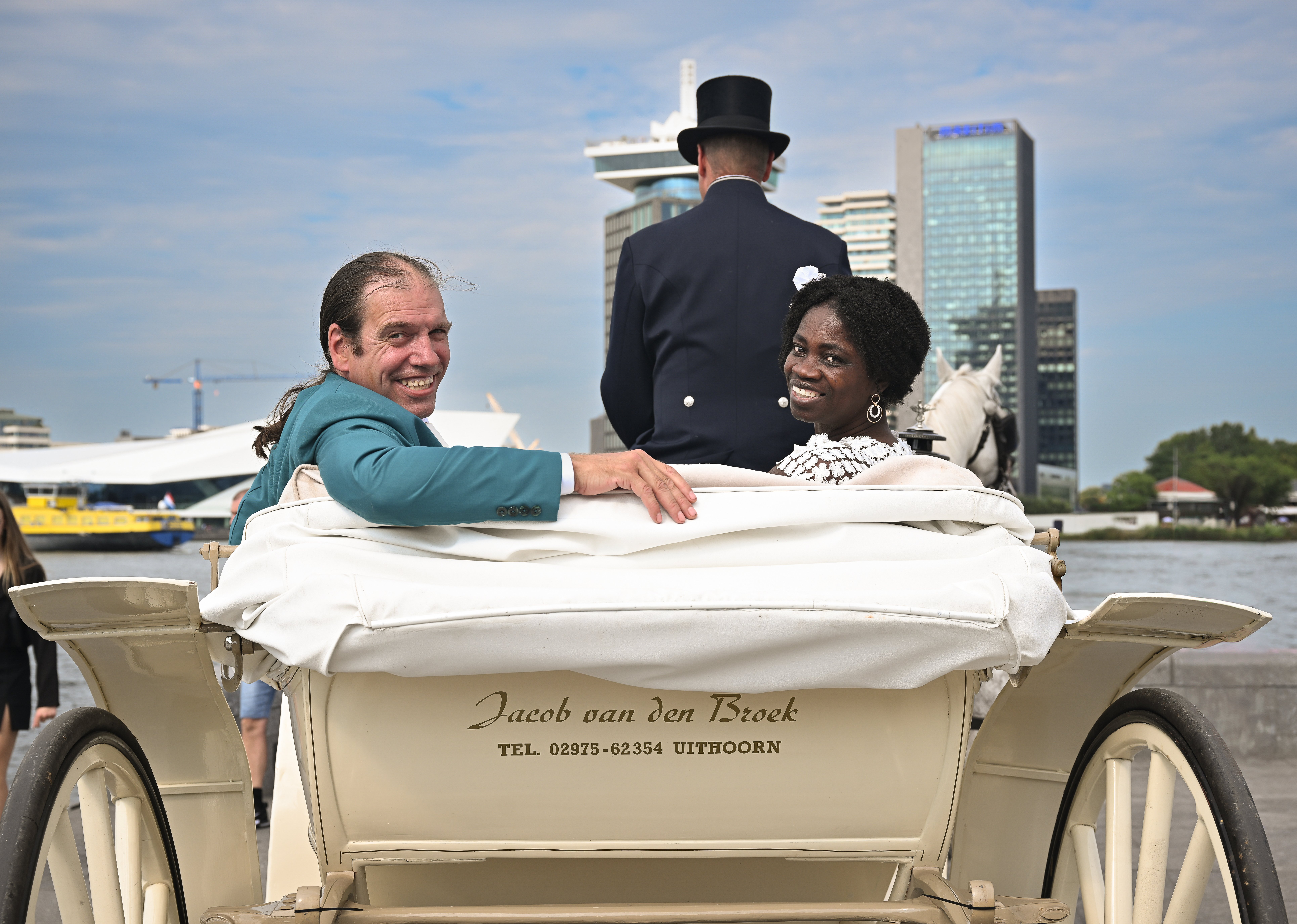 Bride and groom in carriage